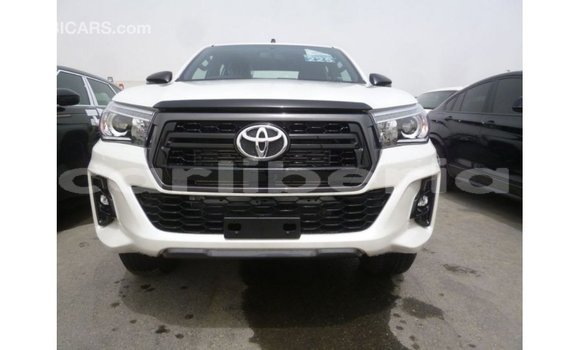 Buy Import Toyota Hilux White Car in Import - Dubai in Bomi County Buy Import Toyota Hilux White Car in Import - Dubai in Bomi County