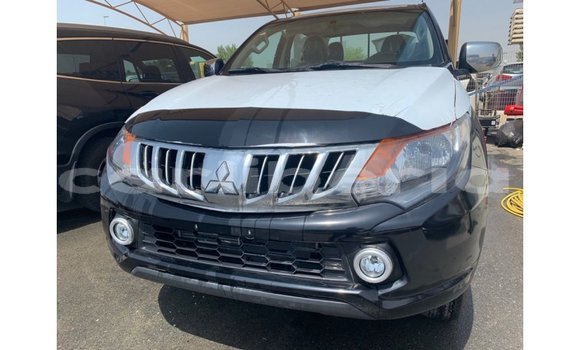Buy Import Mitsubishi L200 Black Car in Import - Dubai in Bomi County Buy Import Mitsubishi L200 Black Car in Import - Dubai in Bomi County