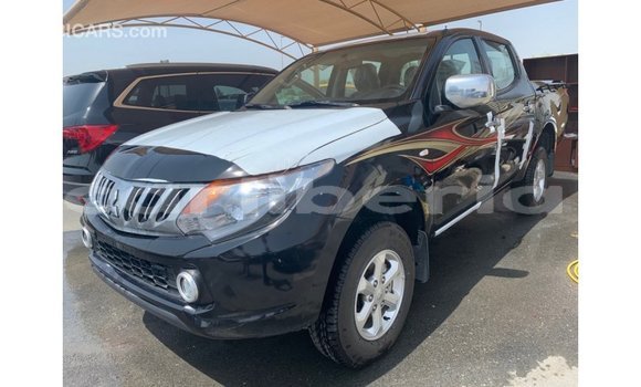Buy Import Mitsubishi L200 Black Car in Import - Dubai in Bomi County Buy Import Mitsubishi L200 Black Car in Import - Dubai in Bomi County