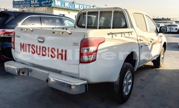 Buy Import Mitsubishi L200 White Car in Import - Dubai in Bomi County Buy Import Mitsubishi L200 White Car in Import - Dubai in Bomi County