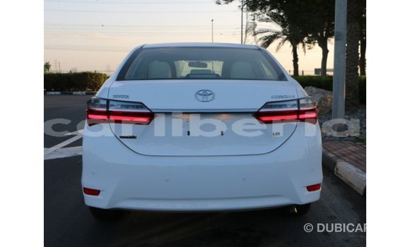 Buy Import Toyota Corolla White Car in Import - Dubai in Bomi County Buy Import Toyota Corolla White Car in Import - Dubai in Bomi County