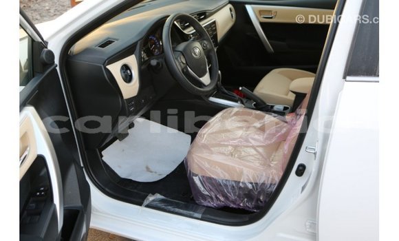 Buy Import Toyota Corolla White Car in Import - Dubai in Bomi County Buy Import Toyota Corolla White Car in Import - Dubai in Bomi County