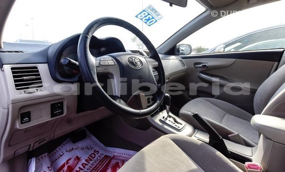 Buy Import Toyota Corolla White Car in Import - Dubai in Bomi County Buy Import Toyota Corolla White Car in Import - Dubai in Bomi County