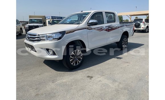 Buy Import Toyota Hilux White Car in Import - Dubai in Bomi County Buy Import Toyota Hilux White Car in Import - Dubai in Bomi County