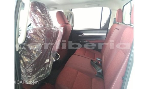 Buy Import Toyota Hilux White Car in Import - Dubai in Bomi County Buy Import Toyota Hilux White Car in Import - Dubai in Bomi County
