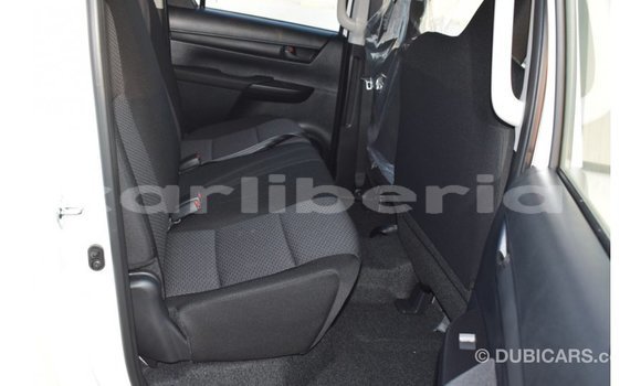 Buy Import Toyota Hilux White Car in Import - Dubai in Bomi County Buy Import Toyota Hilux White Car in Import - Dubai in Bomi County