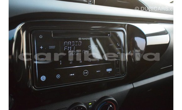 Buy Import Toyota Hilux White Car in Import - Dubai in Bomi County Buy Import Toyota Hilux White Car in Import - Dubai in Bomi County