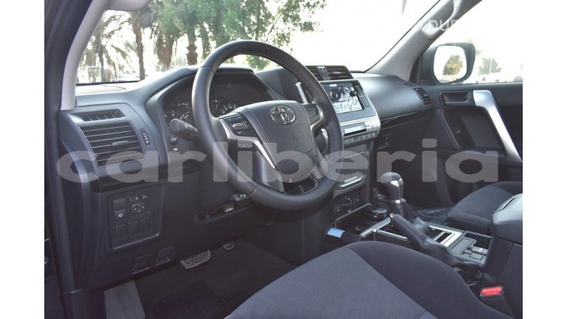 Big with watermark toyota prado bomi county import dubai 2130