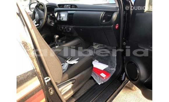 Buy Import Toyota Hilux Black Car in Import - Dubai in Bomi County Buy Import Toyota Hilux Black Car in Import - Dubai in Bomi County