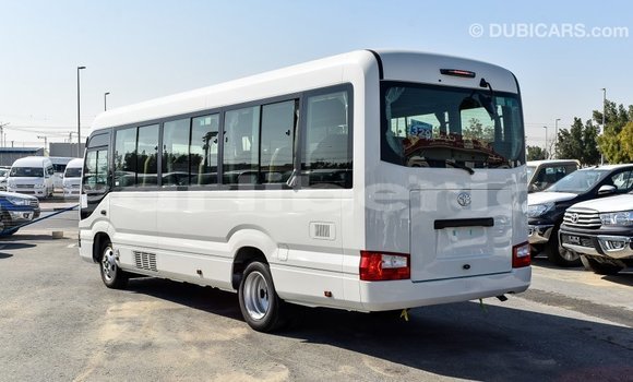 Acheter Import Voiture Toyota Coaster Blanc à Import - Dubai, Comté de Bomi Acheter Import Voiture Toyota Coaster Blanc à Import - Dubai, Comté de Bomi