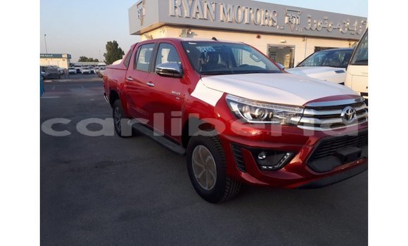 Buy Import Toyota Hilux Red Car in Import - Dubai in Bomi County Buy Import Toyota Hilux Red Car in Import - Dubai in Bomi County