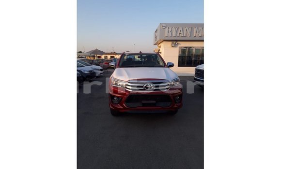 Buy Import Toyota Hilux Red Car in Import - Dubai in Bomi County Buy Import Toyota Hilux Red Car in Import - Dubai in Bomi County