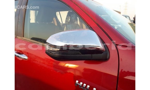 Buy Import Toyota Hilux Red Car in Import - Dubai in Bomi County Buy Import Toyota Hilux Red Car in Import - Dubai in Bomi County