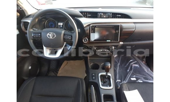 Buy Import Toyota Hilux Red Car in Import - Dubai in Bomi County Buy Import Toyota Hilux Red Car in Import - Dubai in Bomi County