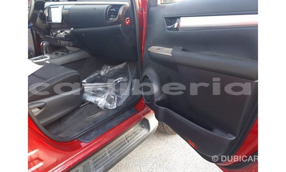 Buy Import Toyota Hilux Red Car in Import - Dubai in Bomi County Buy Import Toyota Hilux Red Car in Import - Dubai in Bomi County