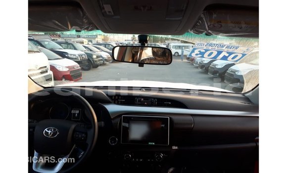 Buy Import Toyota Hilux Red Car in Import - Dubai in Bomi County Buy Import Toyota Hilux Red Car in Import - Dubai in Bomi County