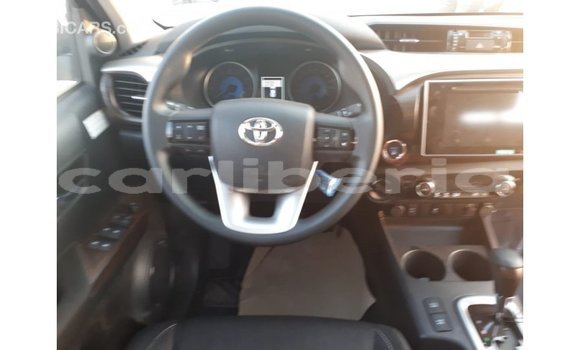 Buy Import Toyota Hilux Red Car in Import - Dubai in Bomi County Buy Import Toyota Hilux Red Car in Import - Dubai in Bomi County