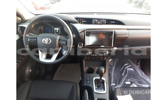 Buy Import Toyota Hilux Red Car in Import - Dubai in Bomi County Buy Import Toyota Hilux Red Car in Import - Dubai in Bomi County