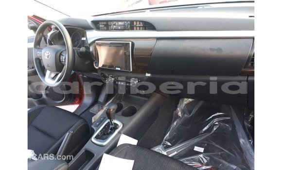 Buy Import Toyota Hilux Red Car in Import - Dubai in Bomi County Buy Import Toyota Hilux Red Car in Import - Dubai in Bomi County
