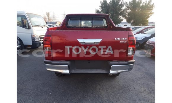 Buy Import Toyota Hilux Red Car in Import - Dubai in Bomi County Buy Import Toyota Hilux Red Car in Import - Dubai in Bomi County