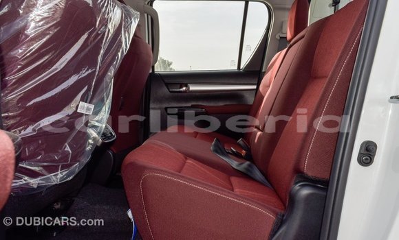 Buy Import Toyota Hilux White Car in Import - Dubai in Bomi County Buy Import Toyota Hilux White Car in Import - Dubai in Bomi County