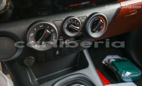 Buy Import Toyota Hilux White Car in Import - Dubai in Bomi County Buy Import Toyota Hilux White Car in Import - Dubai in Bomi County