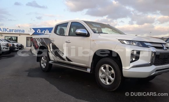 Buy Import Mitsubishi L200 White Car in Import - Dubai in Bomi County Buy Import Mitsubishi L200 White Car in Import - Dubai in Bomi County