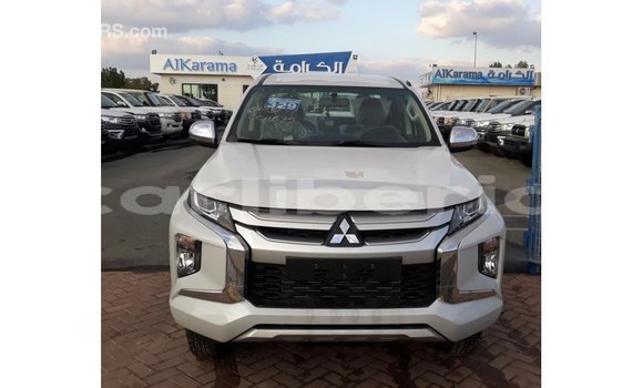 Buy Import Mitsubishi L200 White Car in Import - Dubai in Bomi County Buy Import Mitsubishi L200 White Car in Import - Dubai in Bomi County