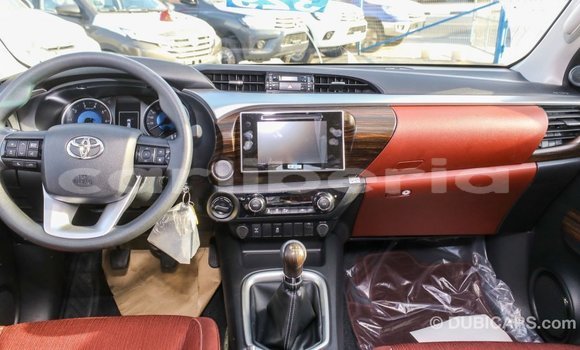 Buy Import Toyota Hilux White Car in Import - Dubai in Bomi County Buy Import Toyota Hilux White Car in Import - Dubai in Bomi County