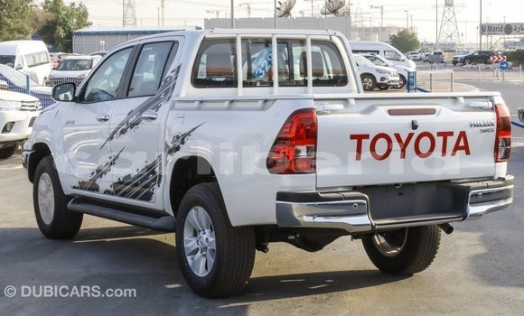 Buy Import Toyota Hilux White Car in Import - Dubai in Bomi County Buy Import Toyota Hilux White Car in Import - Dubai in Bomi County