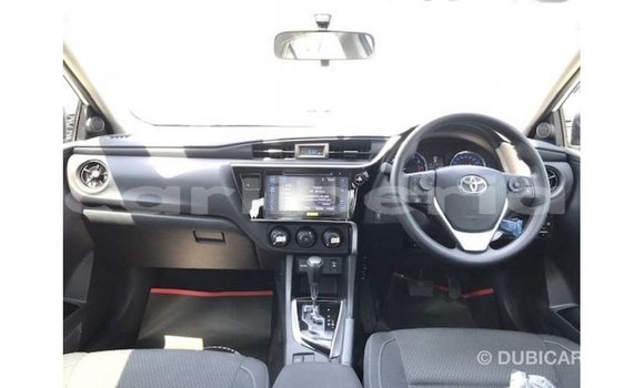 Buy Import Toyota Corolla White Car in Import - Dubai in Bomi County Buy Import Toyota Corolla White Car in Import - Dubai in Bomi County