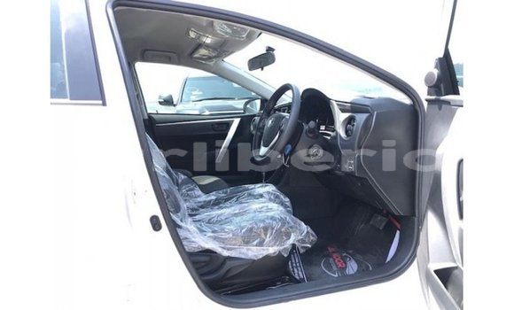 Buy Import Toyota Corolla White Car in Import - Dubai in Bomi County Buy Import Toyota Corolla White Car in Import - Dubai in Bomi County