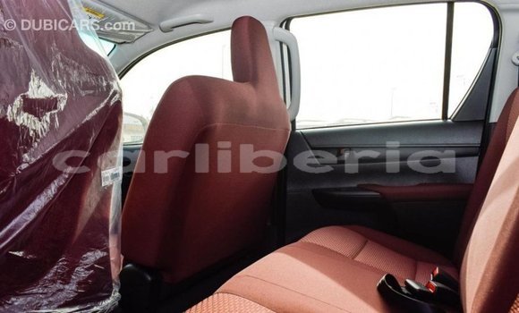 Buy Import Toyota Hilux White Car in Import - Dubai in Bomi County Buy Import Toyota Hilux White Car in Import - Dubai in Bomi County