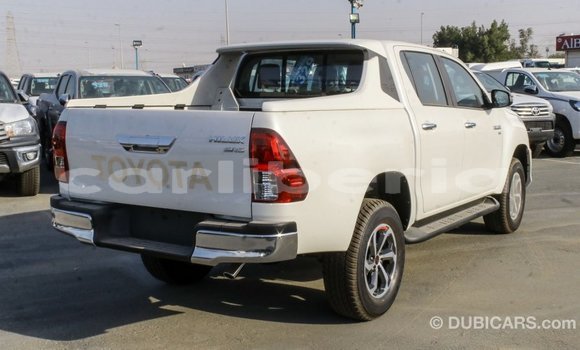 Buy Import Toyota Hilux White Car in Import - Dubai in Bomi County Buy Import Toyota Hilux White Car in Import - Dubai in Bomi County