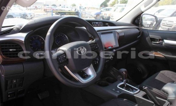 Buy Import Toyota Hilux White Car in Import - Dubai in Bomi County Buy Import Toyota Hilux White Car in Import - Dubai in Bomi County