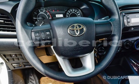 Buy Import Toyota Hilux White Car in Import - Dubai in Bomi County Buy Import Toyota Hilux White Car in Import - Dubai in Bomi County