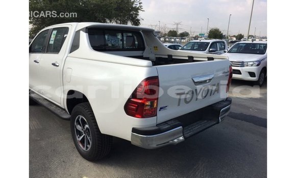 Buy Import Toyota Hilux White Car in Import - Dubai in Bomi County Buy Import Toyota Hilux White Car in Import - Dubai in Bomi County