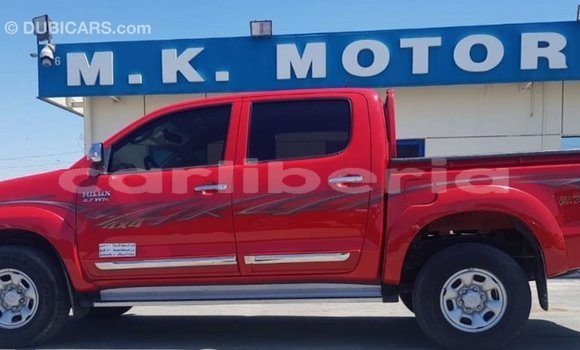 Buy Import Toyota Hilux Red Car in Import - Dubai in Bomi County Buy Import Toyota Hilux Red Car in Import - Dubai in Bomi County