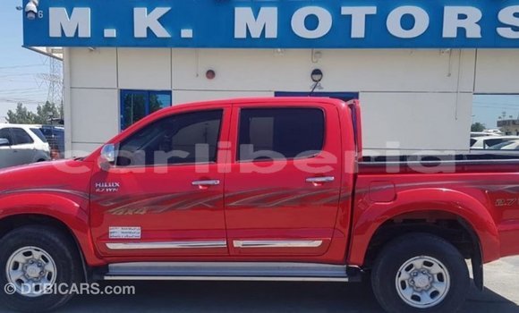 Buy Import Toyota Hilux Red Car in Import - Dubai in Bomi County Buy Import Toyota Hilux Red Car in Import - Dubai in Bomi County