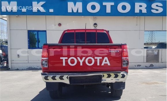Buy Import Toyota Hilux Red Car in Import - Dubai in Bomi County Buy Import Toyota Hilux Red Car in Import - Dubai in Bomi County