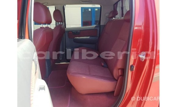Buy Import Toyota Hilux Red Car in Import - Dubai in Bomi County Buy Import Toyota Hilux Red Car in Import - Dubai in Bomi County