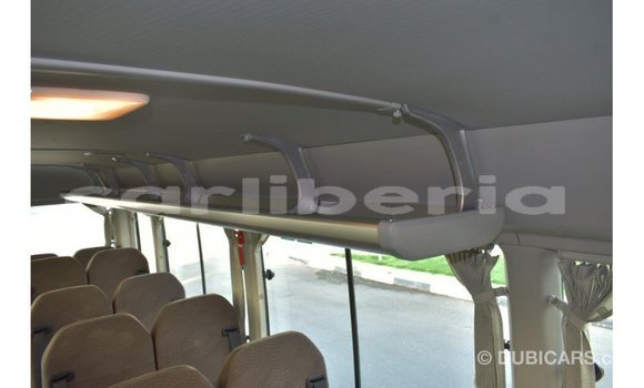 Acheter Import Voiture Toyota Coaster Blanc à Import - Dubai, Comté de Bomi Acheter Import Voiture Toyota Coaster Blanc à Import - Dubai, Comté de Bomi
