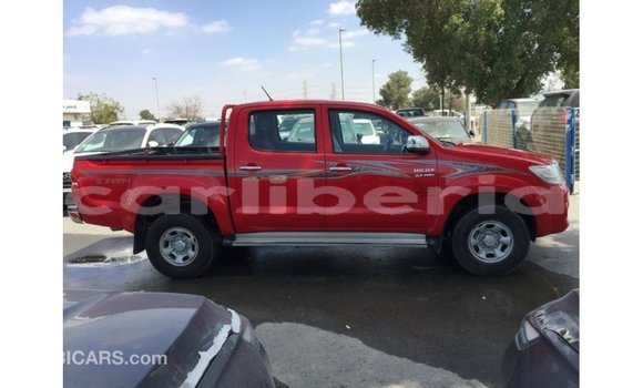 Buy Import Toyota Hilux Red Car in Import - Dubai in Bomi County Buy Import Toyota Hilux Red Car in Import - Dubai in Bomi County
