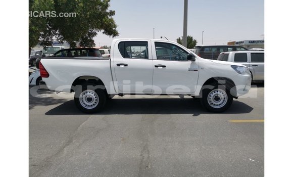 Buy Import Toyota Hilux White Car in Import - Dubai in Bomi County Buy Import Toyota Hilux White Car in Import - Dubai in Bomi County