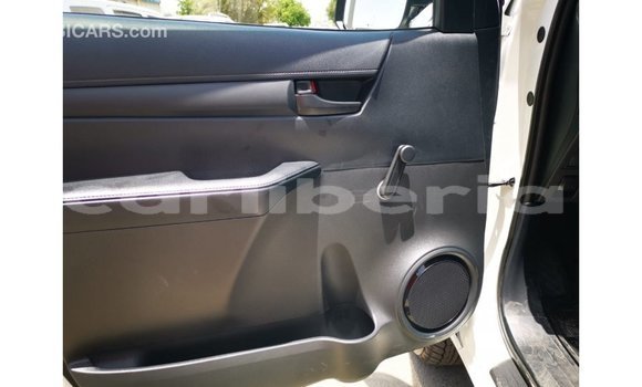 Buy Import Toyota Hilux White Car in Import - Dubai in Bomi County Buy Import Toyota Hilux White Car in Import - Dubai in Bomi County
