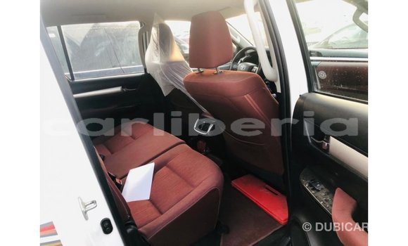 Buy Import Toyota Hilux White Car in Import - Dubai in Bomi County Buy Import Toyota Hilux White Car in Import - Dubai in Bomi County