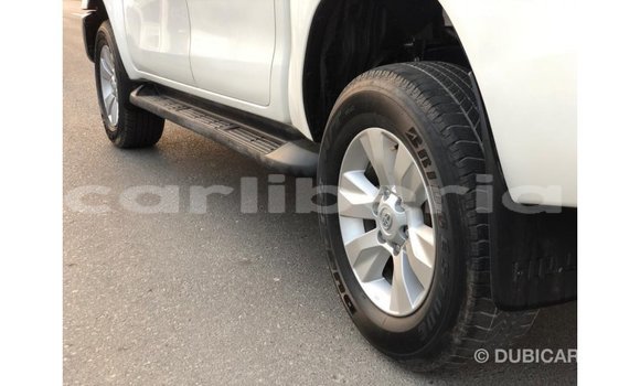 Buy Import Toyota Hilux White Car in Import - Dubai in Bomi County Buy Import Toyota Hilux White Car in Import - Dubai in Bomi County