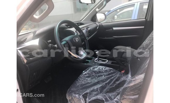 Buy Import Toyota Hilux White Car in Import - Dubai in Bomi County Buy Import Toyota Hilux White Car in Import - Dubai in Bomi County