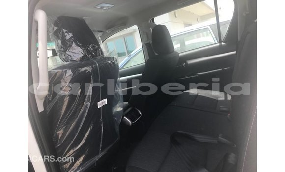 Buy Import Toyota Hilux White Car in Import - Dubai in Bomi County Buy Import Toyota Hilux White Car in Import - Dubai in Bomi County
