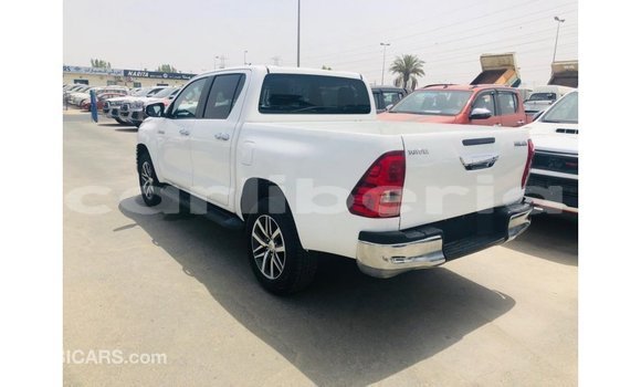 Acheter Import Voiture Toyota Hilux Blanc à Import - Dubai, Comté de Bomi Acheter Import Voiture Toyota Hilux Blanc à Import - Dubai, Comté de Bomi